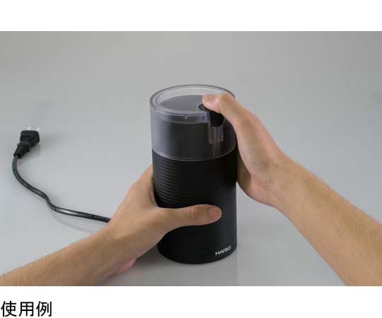 電動コーヒーミル・スイッチ ブラック コンパクトな本体が上から見える状態、スイッチ部分が強調されている様子。