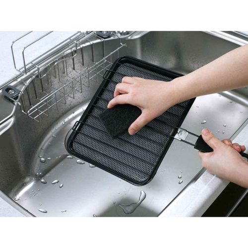 キッチンスポンジ　ピカ王　キッチンクリーナー　コゲ付汚れ用 正面から撮影され、スポンジの質感や形状がはっきりと見える状態