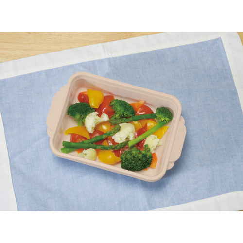 温野菜メーカー　電子レンジ調理器 側面から見た透明な容器が、蒸気穴を持ち蓋と一緒に置かれている様子
