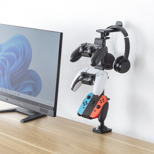 クランプ付きゲームコントローラースタンド(ヘッドフォンホルダー付)　ブラック　1個 黒いクランプが付いたスタンドが側面から見える状態、ヘッドフォンホルダーが上部に設置されている様子。