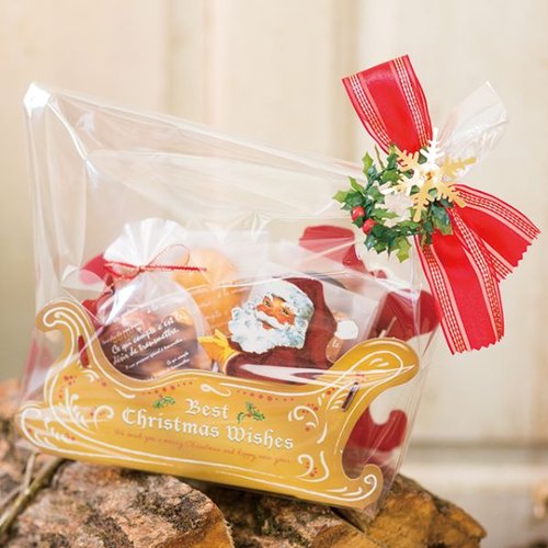 贈答箱 クリスマスアンティークサンタ ワンタッチトレイ-3(20枚) ヘッズ カラフルなデザインのトレイが横向きで並べられた状態