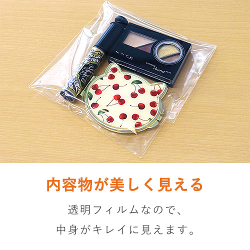 OPP袋 A3サイズ（超特厚・テープ付き） 透明の袋が数枚重なり、上部に剥離紙付きの粘着テープが見える状態