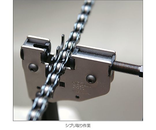 チェーン切り 丸い刃が目立つ、ハンドルの質感が分かる状態