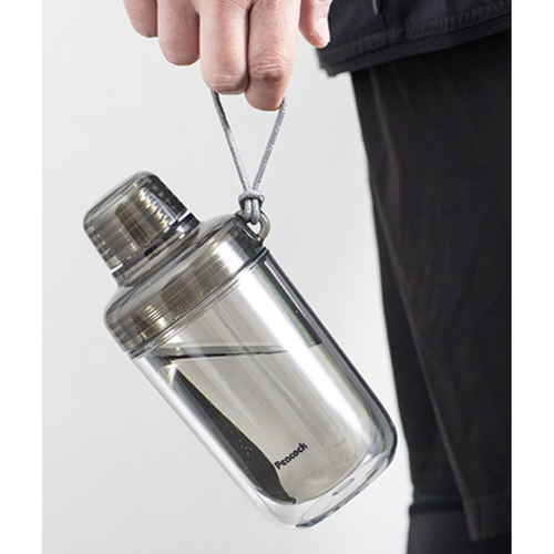 ウォーターボトル　クリアボトル　アクティブボトル　340ml　スモーク スモークカラーの透明ボトルが横向きで置かれている様子