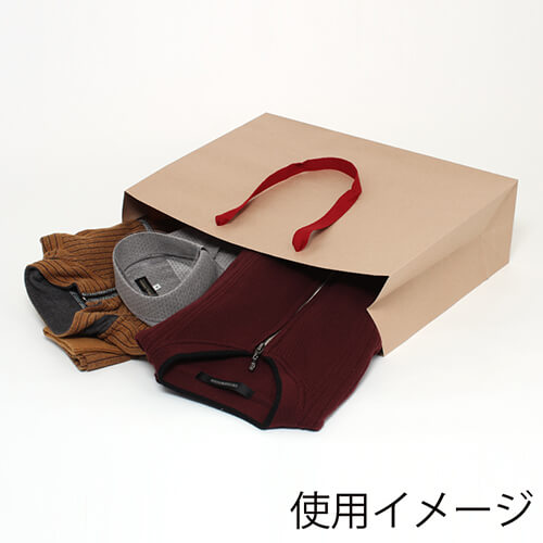 ファッションバッグ（茶・アクリル紐・幅450×マチ135×高さ320mm） 正面を向けて立てられた茶色のバッグが1点、上部で透明なアクリル紐が輪になって重なっている様子