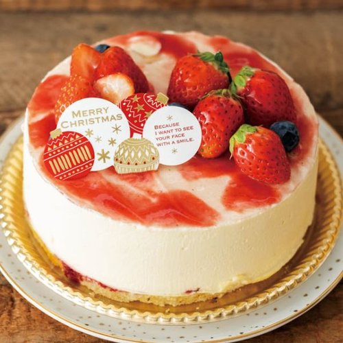 弁当ピック クリスマスオーナメント ケーキピック-1(50枚) ヘッズ ケーキに刺さった複数のクリスマスオーナメントピックが見える状態
