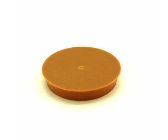 イスゴム　平置　丸型　薄茶　対象脚サイズ40mm 平らな面に置かれた薄茶色の丸型パーツの詳細が見える状態