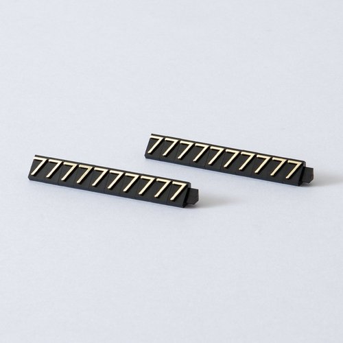 陳列備品 ニュープライスキューブ補充L用(20粒) 黒/金 7 友屋 黒と金の配色で整然と並ぶ20粒のパッケージ