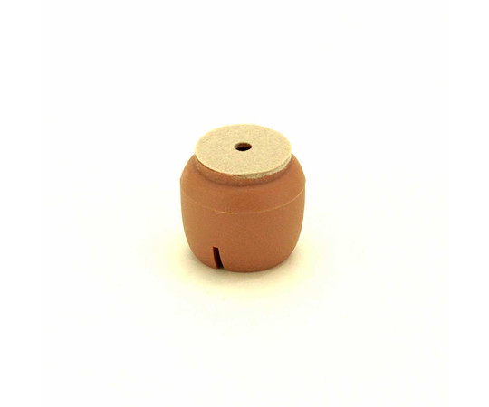 ワイドフェルトキャップ　丸脚用　16-21mm 平らな面に置かれた、丸みのあるキャップが側面から見える状態