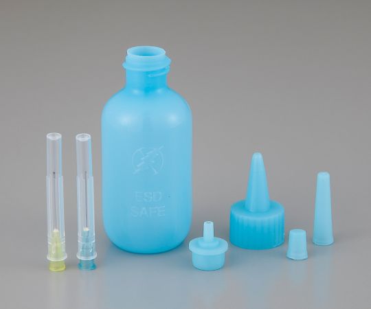 シリンジオイラー　60mL 透明な容器に入ったオイラーが横向きに置かれた状態