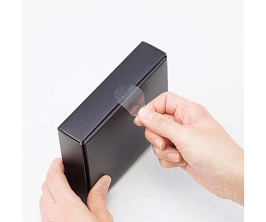 タックラベルシール　プル付透明　28×40mm　32片 透明なシールが並ぶパッケージの側面