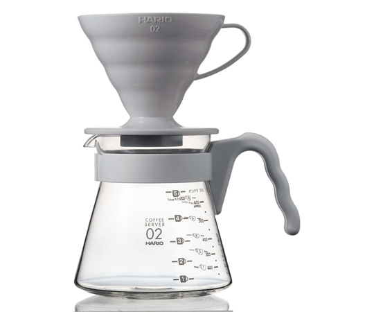 V60コーヒーサーバー02 18個入 透明なプラスチック製のパッケージに18個のサーバーが整然と収められている様子