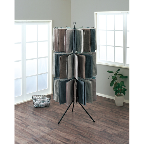 物干し　ポーリッシュ　パラソルスタンド3段　　ブラック スタンドの上部が開いている状態で、支柱がしっかり設置されている様子