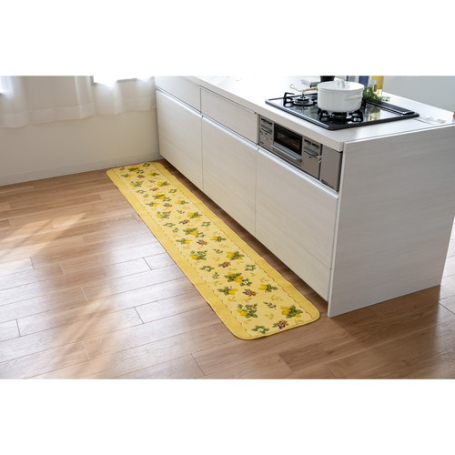 プロヴァンスシエル　キッチンマット　約45×240cm　YE　イエロー 明るいイエローのキッチンマットがフラットに広がっている様子