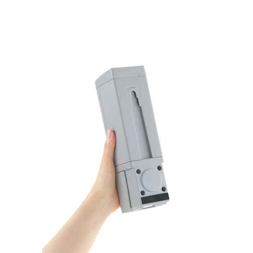 ディスペンサー　シールフック　下から出てくるディスペンサー　500ml　ホバー　グレー シンプルなデザインのグレーのディスペンサーが上部から見下ろされている様子