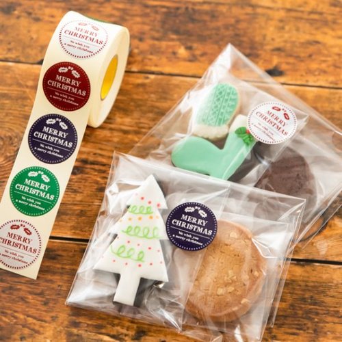 クリスマスポイントロールシール-1(500枚) ヘッズ カラフルなデザインのシールが重なっている様子