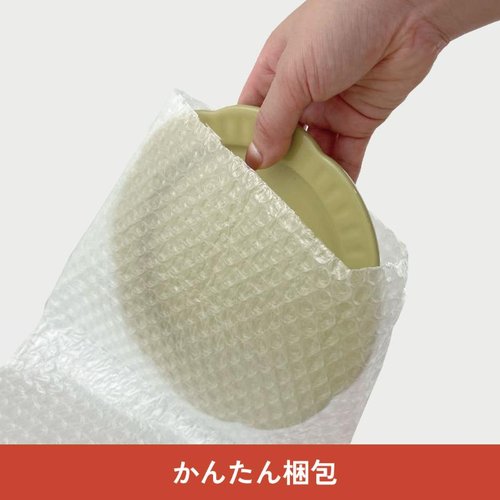 緩衝材 らくらく梱包グッズ エアクッション袋 B5サイズ フロンティア 透明なエアクッション袋が重ねて配置されている様子