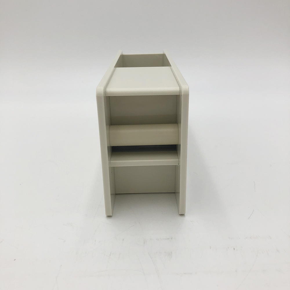 カラーラベルディスペンサー　53×195×88mm 透明な蓋が開いており、中にカラフルなラベルが見える状態