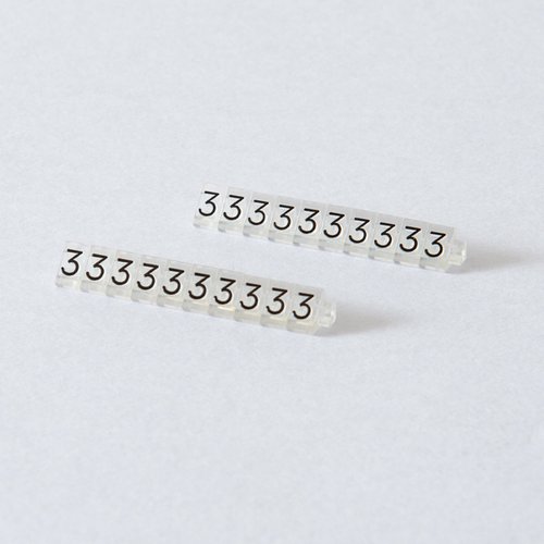 陳列備品 ニュープライスキューブ補充S用(20粒) 透明/黒 3 友屋 透明で黒い円形パーツが整然と並んだ様子