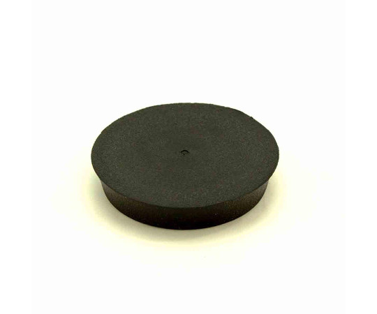 イスゴム　平置　丸型　黒　対象脚サイズ50mm 表面に光沢のある黒い丸型のゴムが平置きされている様子