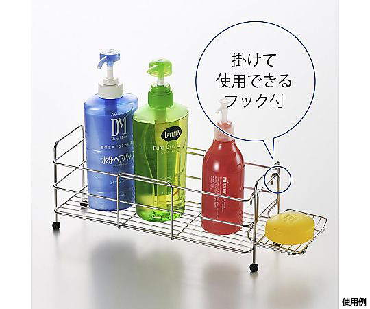 アメニック ソープラック 銀色の金属製ソープラックが壁に取り付けられ、洗面台の上に位置している様子