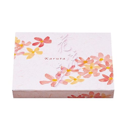 仕出し弁当容器 90-70花流多ワンピース・中仕切90-70C-1白セット 北原産業 色とりどりの花模様が施された容器が横向きに並んでいる様子