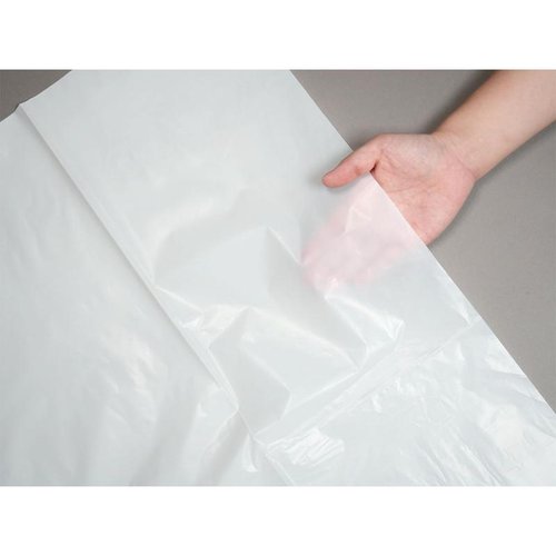 LDゴミ袋 nocoo(ノクー) 業務用ポリ袋 70L 白半透明 10枚 0.040mm 日本サニパック 半透明の袋が整然と積み重ねられ、開口部が広げられた状態