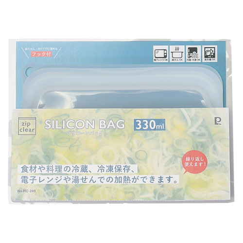 保存袋　330ml　ジップクリア　シリコーンバッグ 透明なシリコン製のフラットな保存袋が机の上に置かれている。