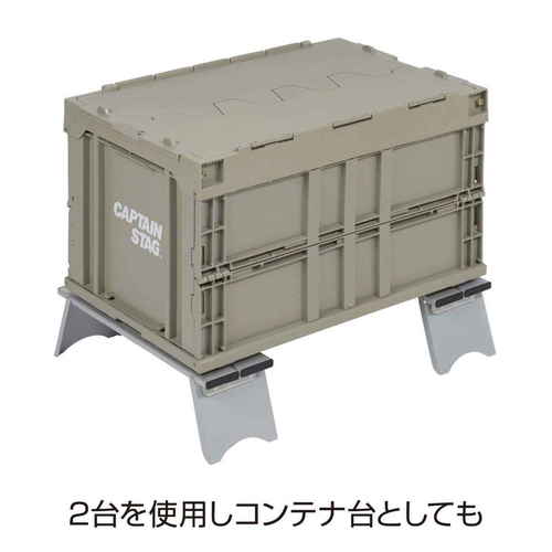 アウトドアテーブル　アルミソロテーブル　連結機能付　キャプテンスタッグ スタイリッシュなデザインのテーブルが屋外で広げられ、連結機能の一部が示されている様子
