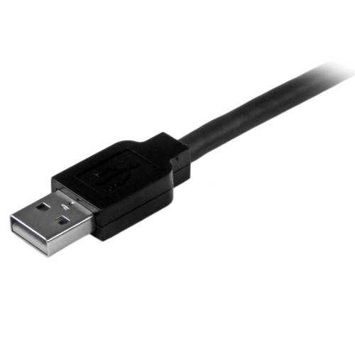 USB2.0　アクティブリピーターケーブル　15m　Aタイプ(オス)-Bタイプ(オス)　ブラック　1本 黒いリピーターケーブルが床に置かれ、両端にコネクタが見える状態