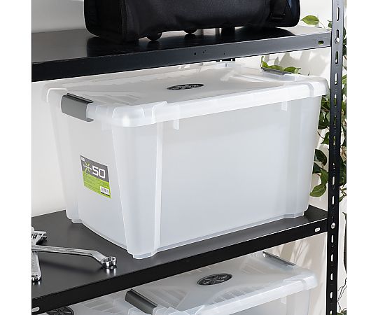 エックスコンテナー　600×410×340mm 上部が開いた状態で、床に置かれた大きなコンテナが見える。