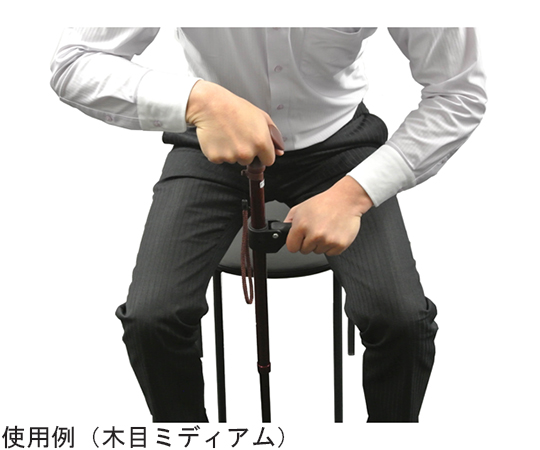 かるがもオム 補助グリップ付 伸縮S・M兼用 木目ミディアム パッケージの側面に木目調のデザインが施され、補助グリップが見える状態