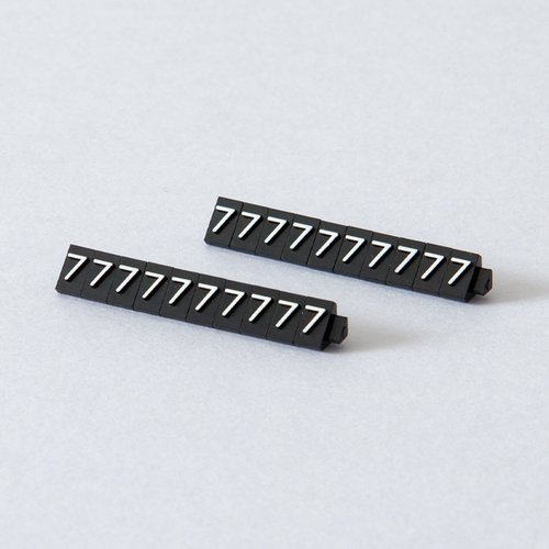 陳列備品 ニュープライスキューブ補充S用(20粒) 黒/白 7 友屋 黒と白の組み合わせで整然と並んだ補充用パーツ
