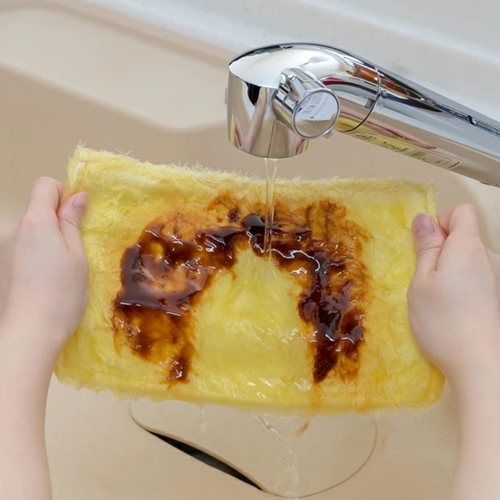 ふきん　ふしぎクロス　イエロー 鮮やかなイエローのクロスが広げられた状態