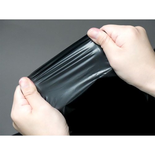 LDゴミ袋 nocoo(ノクー) 業務用ポリ袋 90L 黒 10枚 0.050mm 日本サニパック 黒のゴミ袋が10枚束になり、厚みや質感がわかる状態