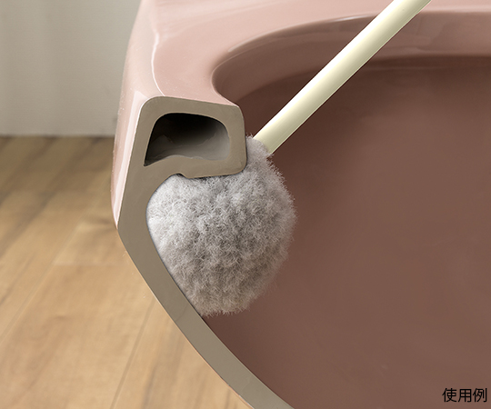 びっくり抗菌トイレクリーナーDX　サトミツ棒 パッケージの前面が強調された状態で、清掃効果を示すアイコンが目立つデザイン