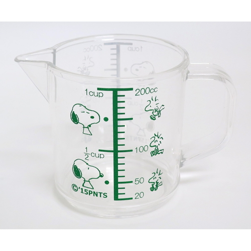 計量カップ メジャーカップ スヌーピー 200ml スヌーピーのイラストが描かれた透明な計量カップの側面が見える状態