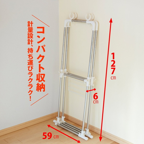 物干し　タオル掛け付きベランダ物干し台　屋外　ベランダ　タオル干し タオル掛けが付いた物干し台が正面から見える、明るい屋外のベランダで使用されている様子