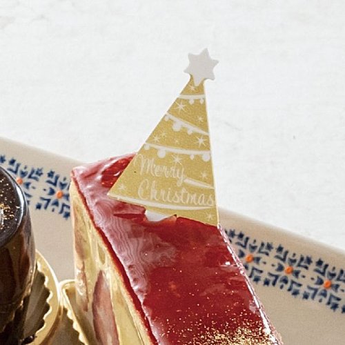 弁当ピック クリスマスケーキピック-ゴ-ルドツリー(100枚) ヘッズ 金色のクリスマスツリー形状のピックが整然と並ぶ様子