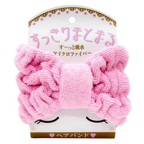 すっきりまとまるヘアバンド 鮮やかな色合いの布地にまとめられたヘアバンドが見える状態