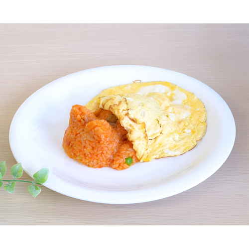 ごはん型　ごはん　de　ニャン 白いごはんの形をしたおもちゃが横に置かれている様子