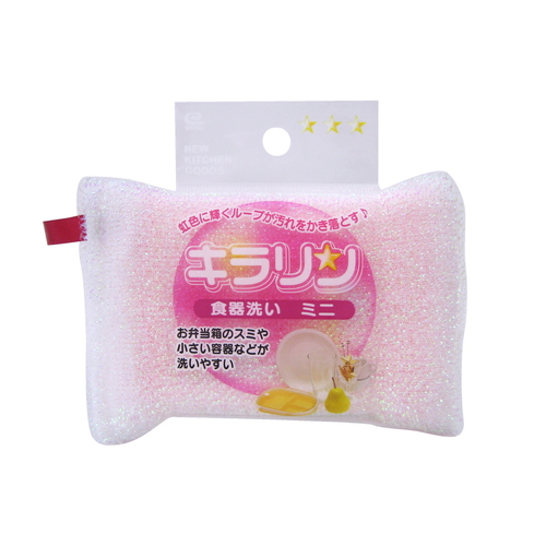 キッチンスポンジ　キラリン食器洗い　ミニ 明るい色合いのスポンジが横向きに置かれ、部分的に泡が付着している様子