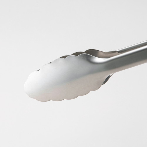 セレクト100　ミニトング　18cm 軽やかな金属製のトングが上向きに置かれている様子