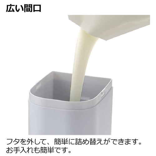 ディスペンサー　シールフック　下から出てくるディスペンサー　500ml　ホバー　グレー 透明なボディのディスペンサーから液体が出ている様子