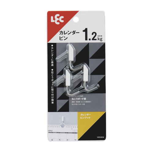 フック　カレンダーピンフック　3個入り　耐荷重1.2kg 透明なフックが壁に取り付けられ、カレンダーが吊るされた様子