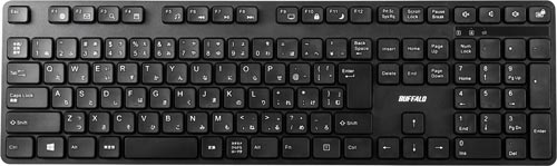 無線キーボード 静音仕様 スリムなデザインのキーボードが黒い背景に置かれている様子