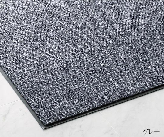 ニュー吸水マット ランナー180cm幅(グリーン) 緑色の吸水マットが床に敷かれ、唾液や水気を吸収している様子