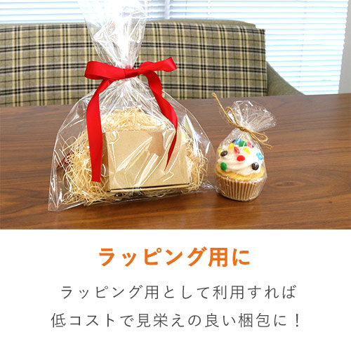 OPP袋 A3サイズ（超特厚・テープ付き） テープ付きフタが折り返され厚手に見える透明な袋が数枚重なって平置きされた状態