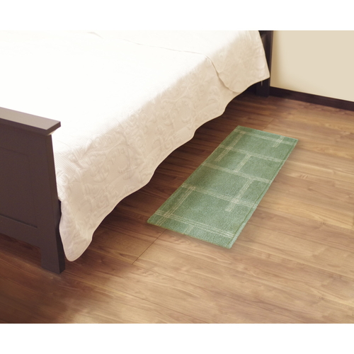 キッチンマット　kietoインテリアマット　45×120cm　グリーン 柔らかなテクスチャの上に広がる緑色のマットが床に敷かれている様子