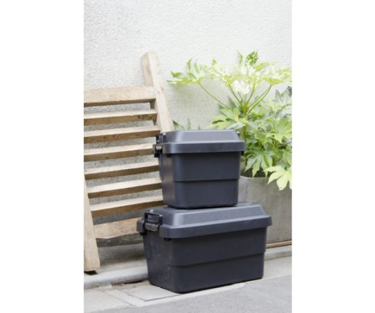 トランクカーゴ　30L　黒 黒いトランクカーゴが横向きで置かれ、フタが開いた状態で内部が見える様子。